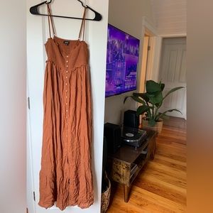 Currently on Vick website SAINT JEAN POCKETED SMOCKED MAXI DRESS - CAMEL